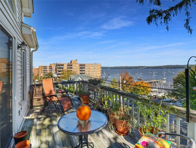 a view of a balcony with an ocean view