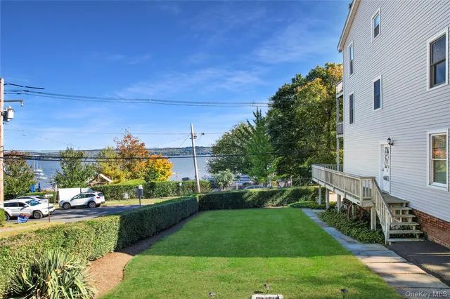 a view of a garden with seating area