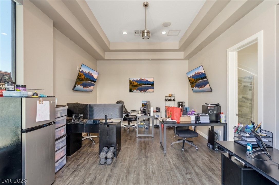 5 Crystal Tree Pass Henderson, NV 89052 - Photo 45 of 67 A versatile office space with tray ceilings, ample room for multiple workstations, and durable flooring.