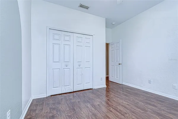 a utility room with cabinets washer and dryer