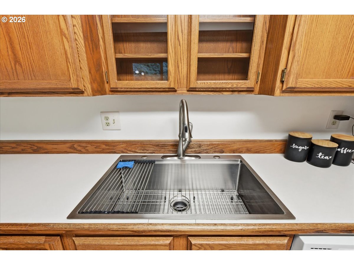 13102 Northwest 8th Way, Unit C Vancouver, WA 98685 - Photo 11 of 41 a view of kitchen sink and cabinet