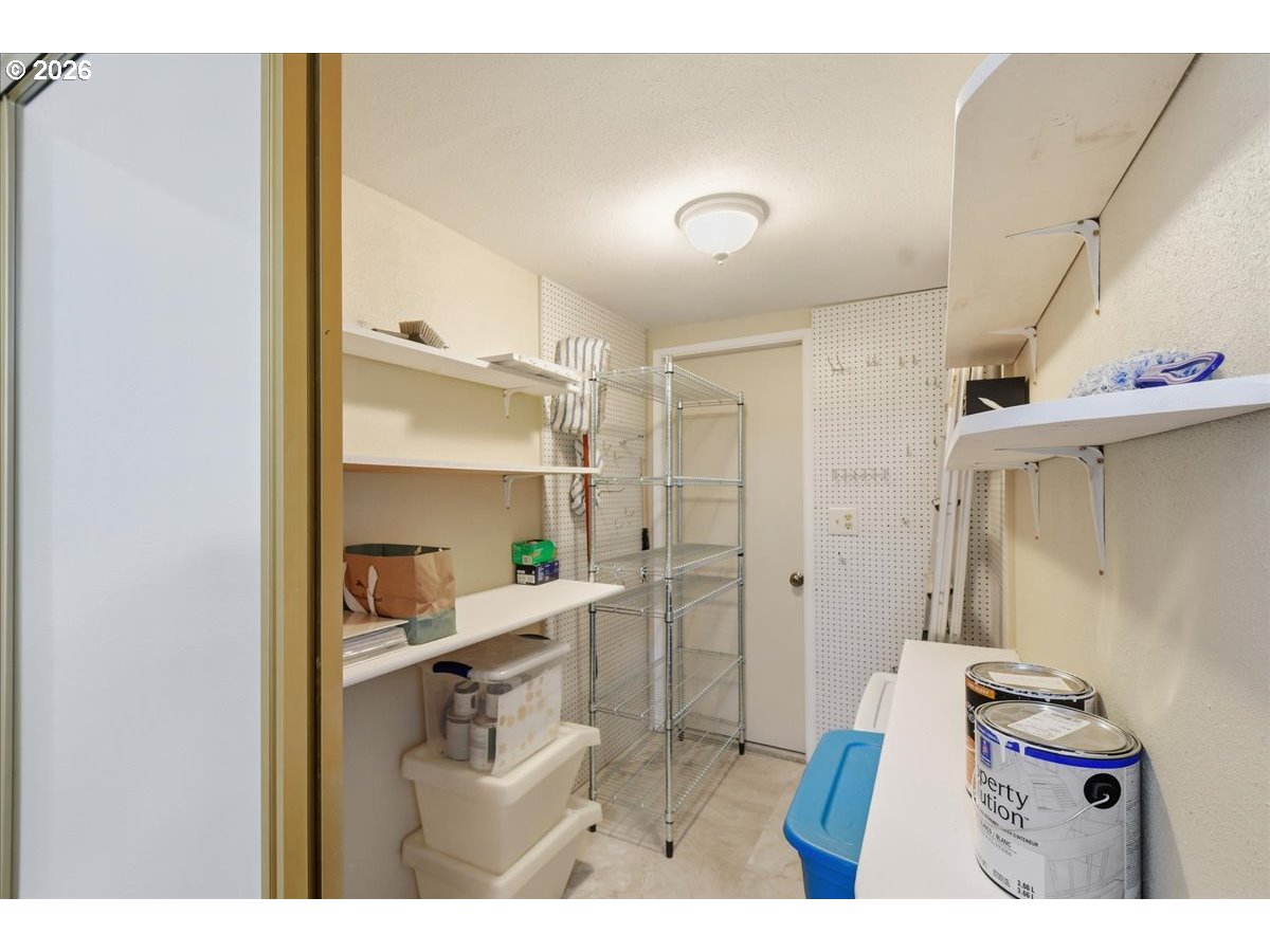 13102 Northwest 8th Way, Unit C Vancouver, WA 98685 - Photo 18 of 41 a bathroom with a sink a mirror and shower