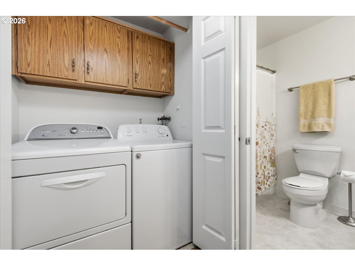 13102 Northwest 8th Way, Unit C Vancouver, WA 98685 - Photo 20 of 41 a bathroom with a sink toilet and vanity