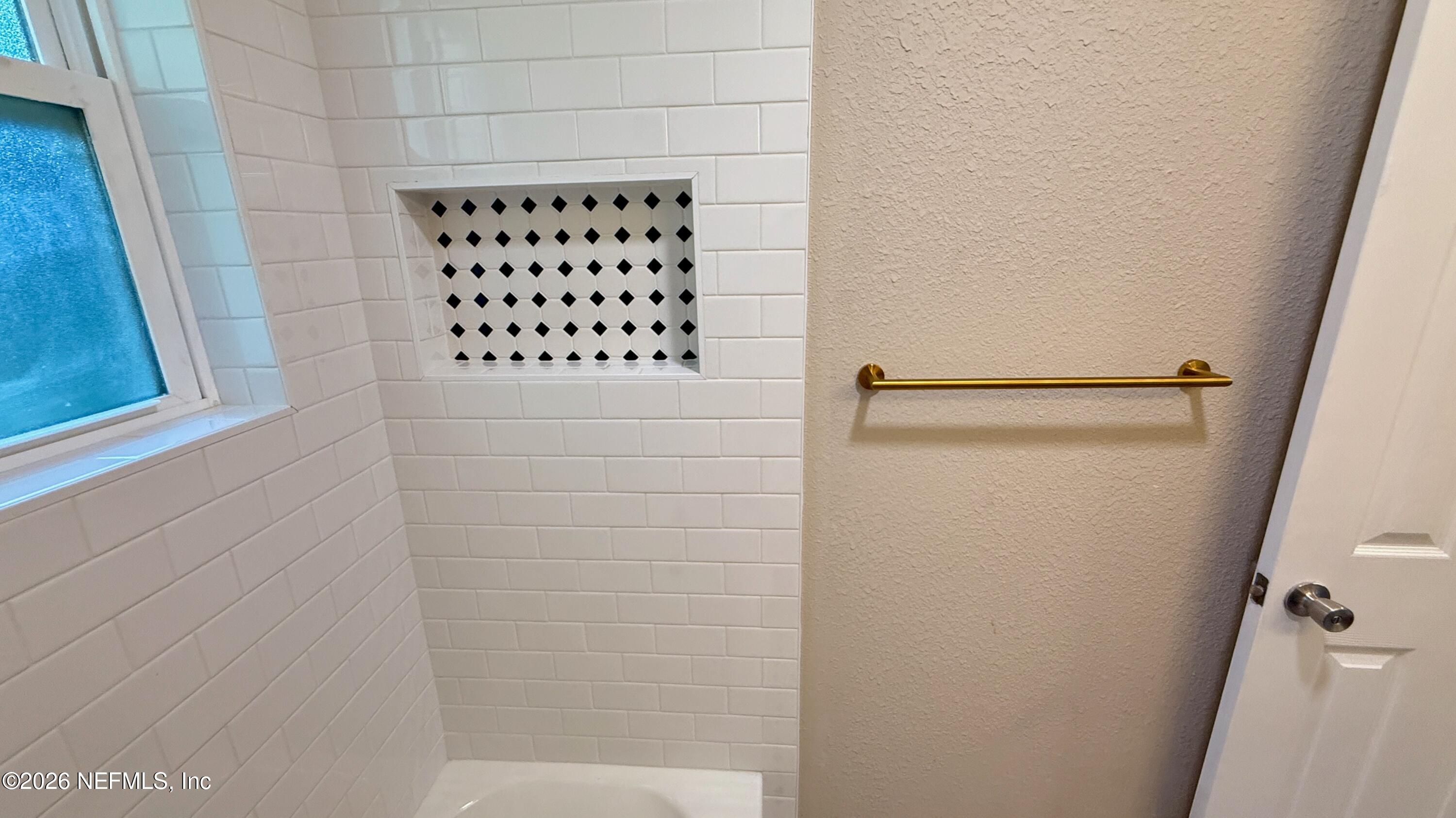 696 Kestner Road Atlantic Beach, FL 32233 - Photo 11 of 18 a bathroom with a shower