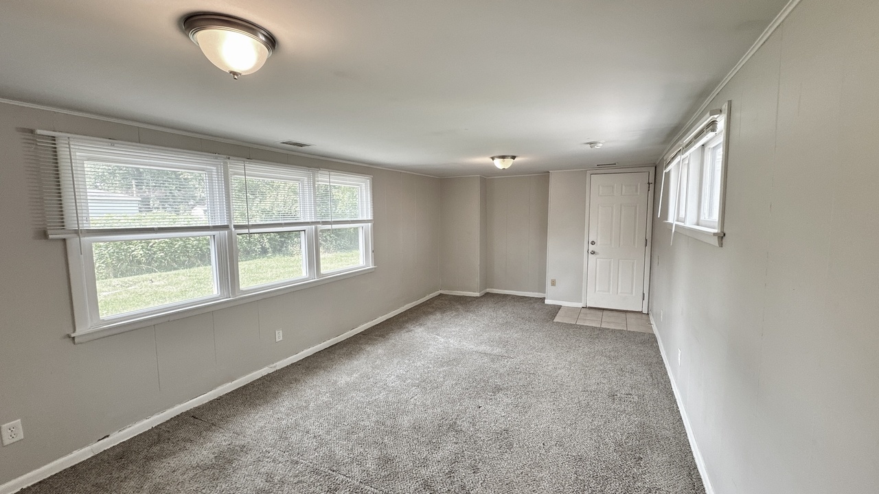 3512 John Street Steger, IL 60475 - Photo 12 of 18 an empty room with windows and closet