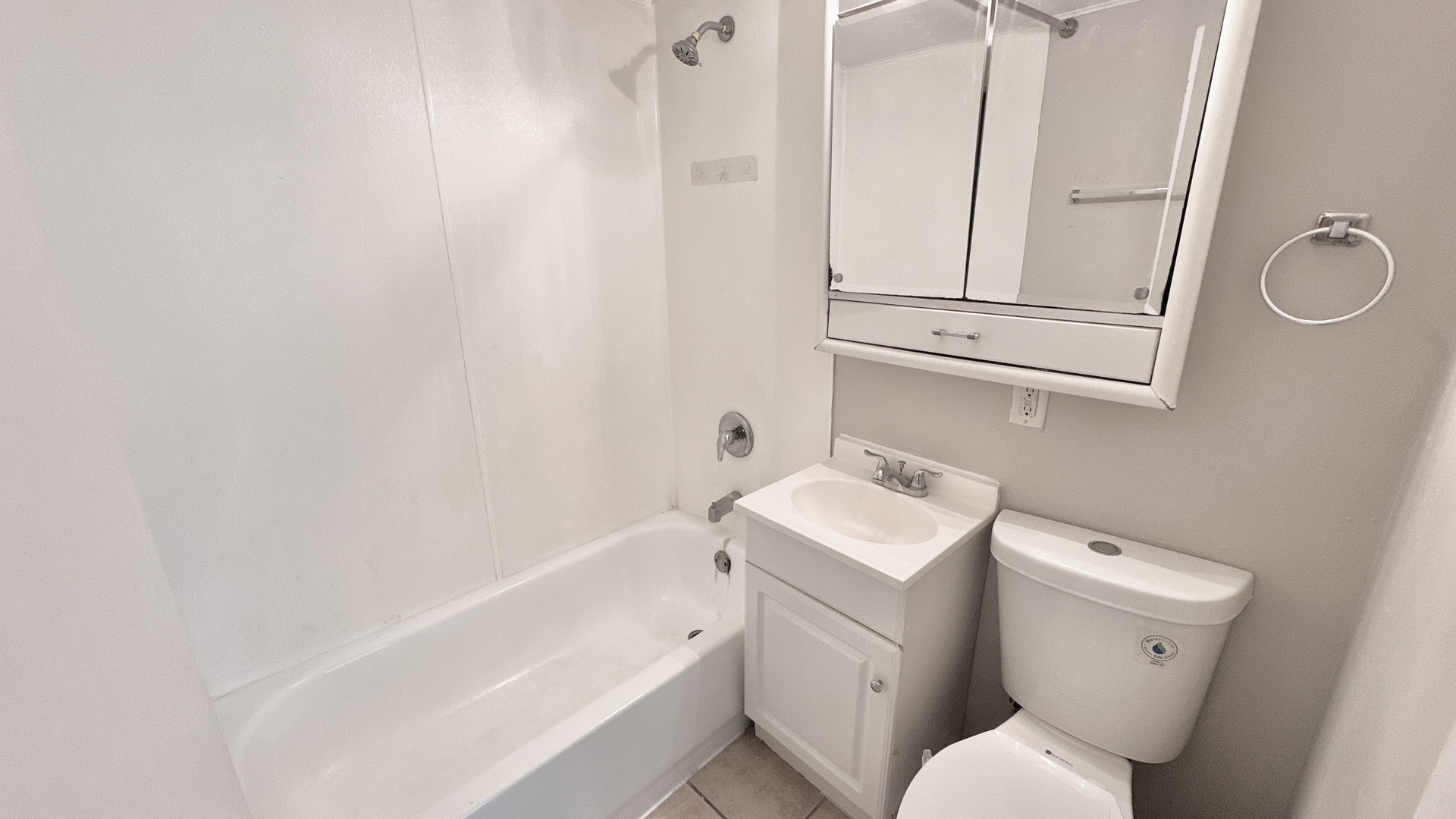 3512 John Street Steger, IL 60475 - Photo 15 of 18 a bathroom with a sink a toilet and bathtub