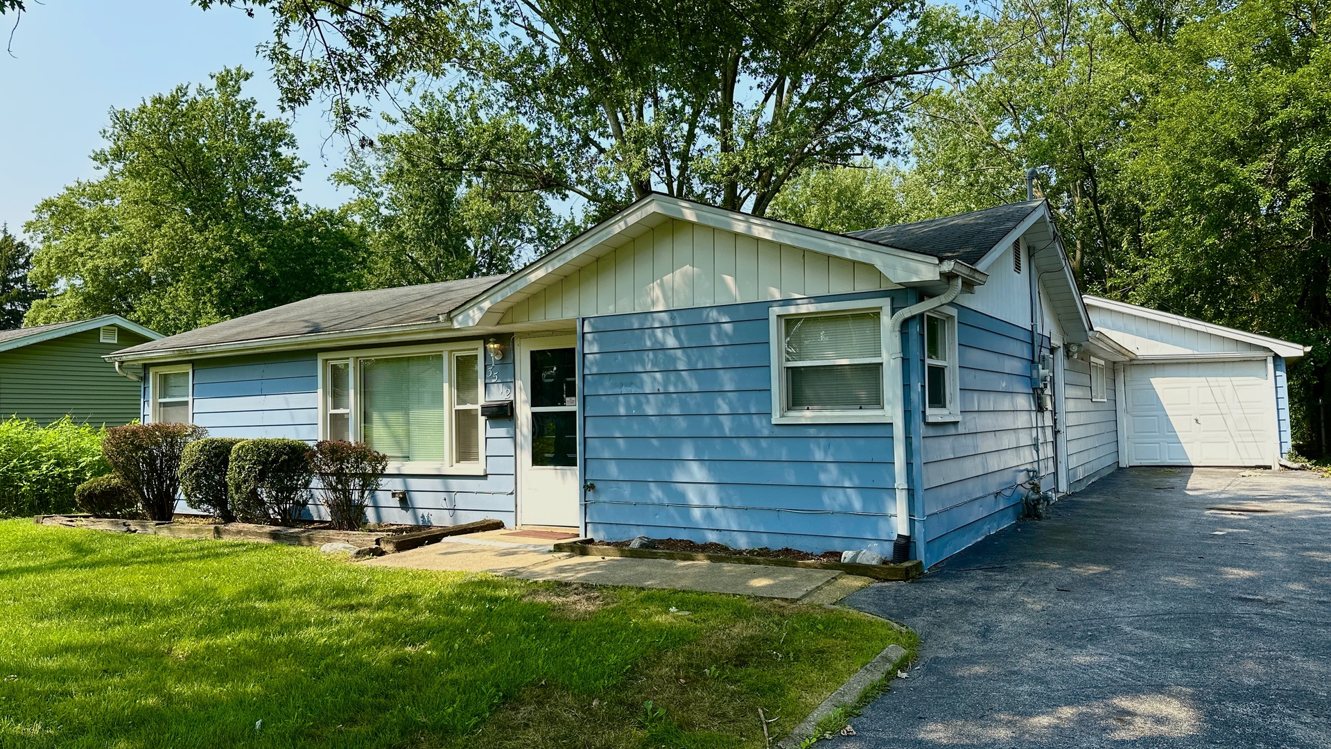 3512 John Street Steger, IL 60475 - Photo 2 of 18 a front view of a house with a yard