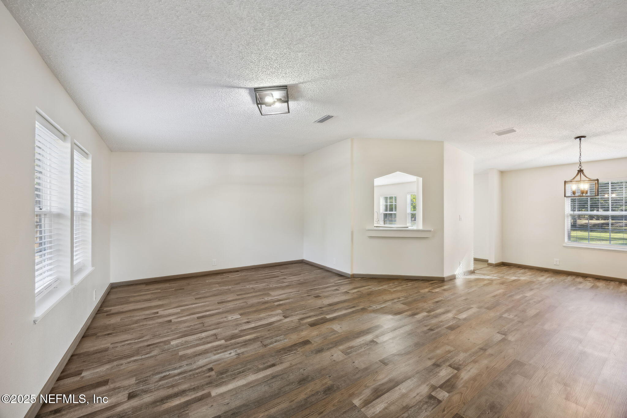 6034 Leona Padgett Road Jacksonville, FL 32234 - Photo 12 of 37 a view of an empty room with a window