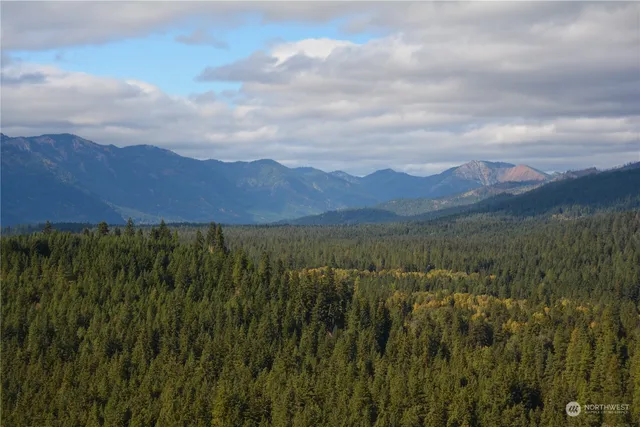 a view of mountains and valleys