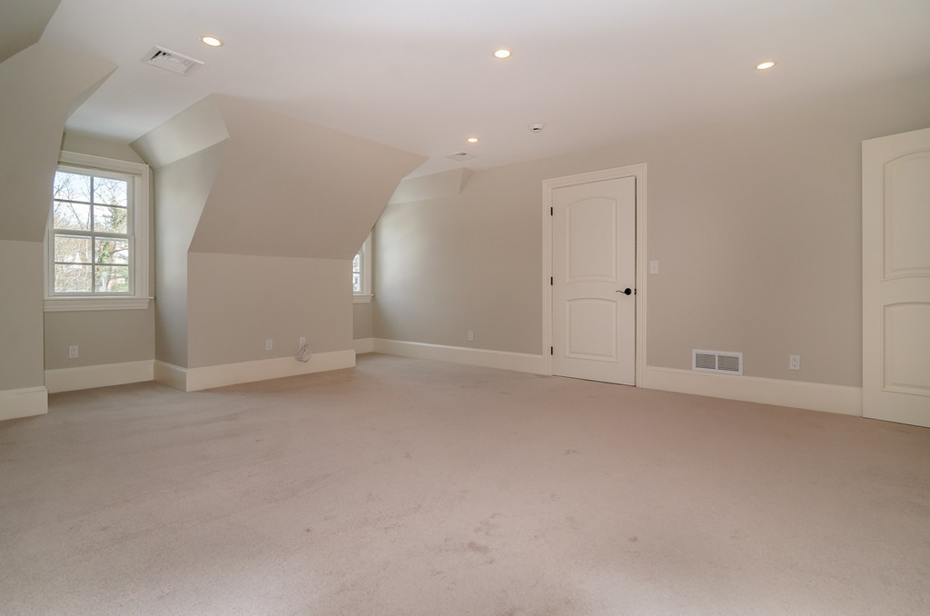 24 Audubon Road Wellesley, MA 02481 - Photo 15 of 19 an empty room with windows and closet