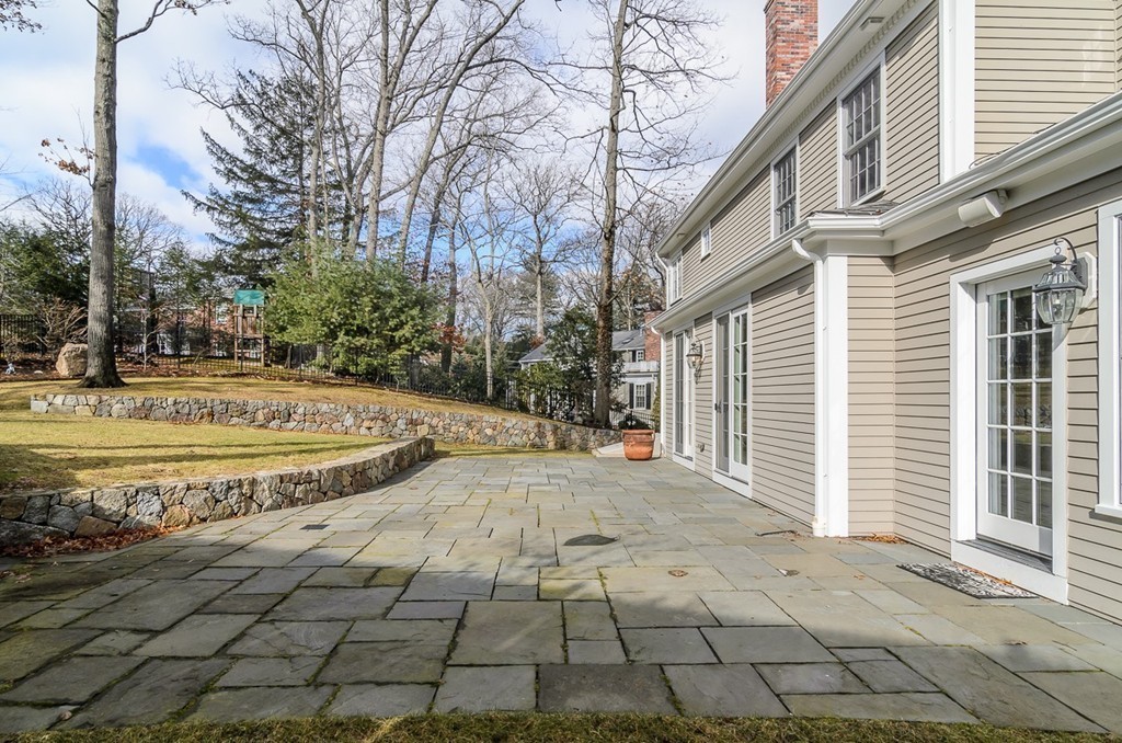 24 Audubon Road Wellesley, MA 02481 - Photo 17 of 19 a view of a house with a yard