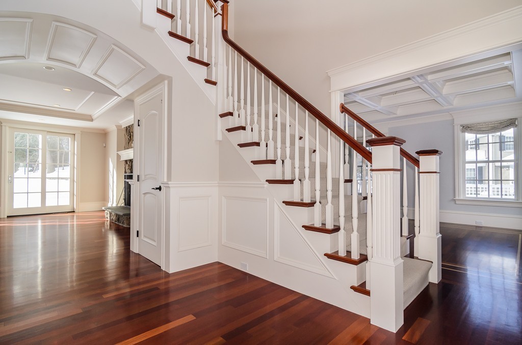 24 Audubon Road Wellesley, MA 02481 - Photo 2 of 19 a view of entryway with wooden floor and stairs