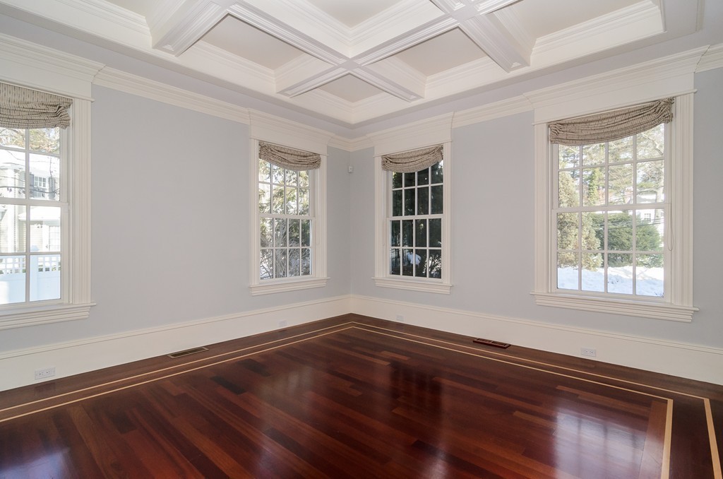 24 Audubon Road Wellesley, MA 02481 - Photo 5 of 19 a view of an empty room with wooden floor and a window