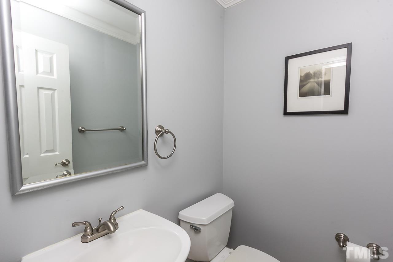 11916 Radner Way Raleigh, NC 27613 - Photo 12 of 29 a bathroom with a sink a toilet and shower