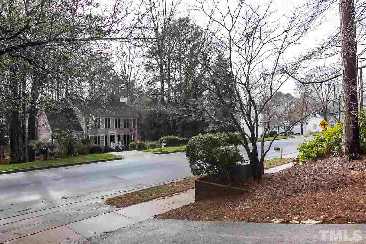 11916 Radner Way Raleigh, NC 27613 - Photo 29 of 29 a view of a street with a building and trees