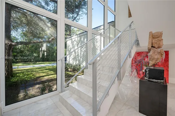 a bathroom with a balcony