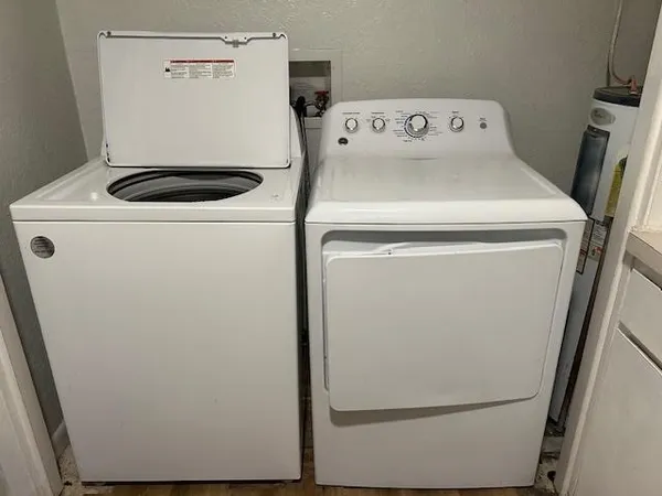 a utility room with dryer and washer