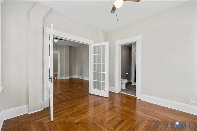 a view of livingroom with hardwood floor and hallway