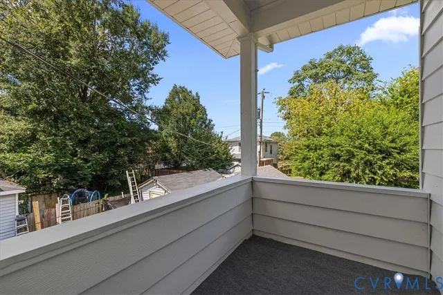 a view of a window and tree in front of a window