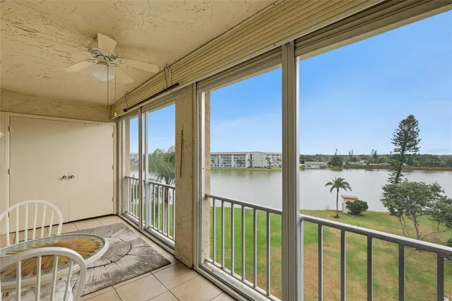 a view of a balcony with lake view and a ocean view