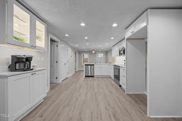 a view of kitchen with wooden floor