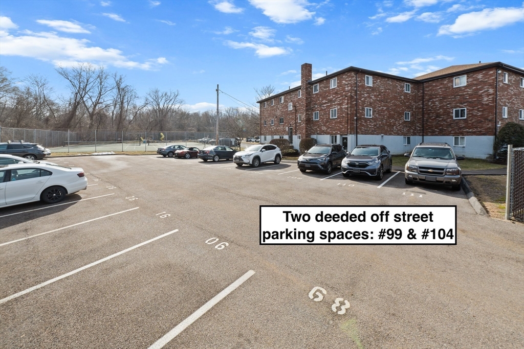 26 Westgate Road, Unit 264 Chestnut Hill, MA 02467 - Photo 21 of 30 a view of a street with a building in the background