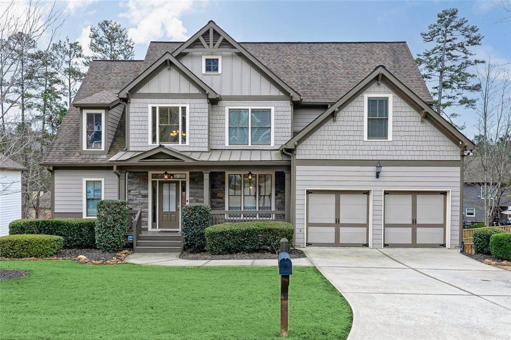 28 Blue Spruce Trail Dallas, GA 30157 - Photo 1 of 1 a front view of a house with a yard and porch