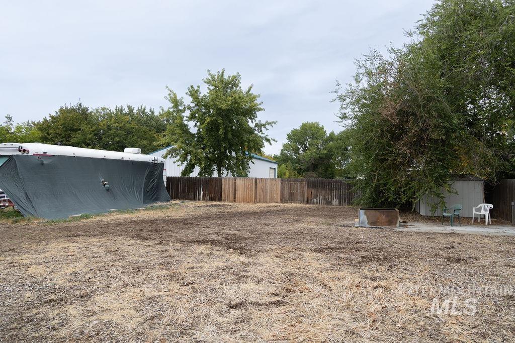 5420 West Targee Street Boise, ID 83705 - Photo 8 of 17 View of yard with a storage unit