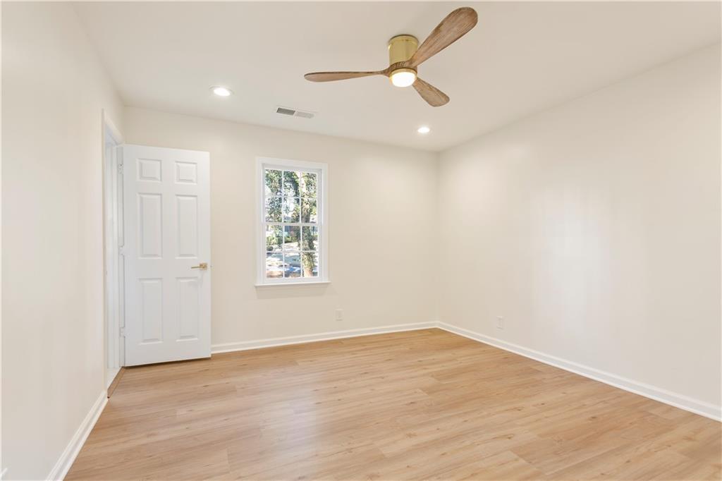 626 Reed Road Smyrna, GA 30082 - Photo 25 of 40 wooden floor in an empty room with a window