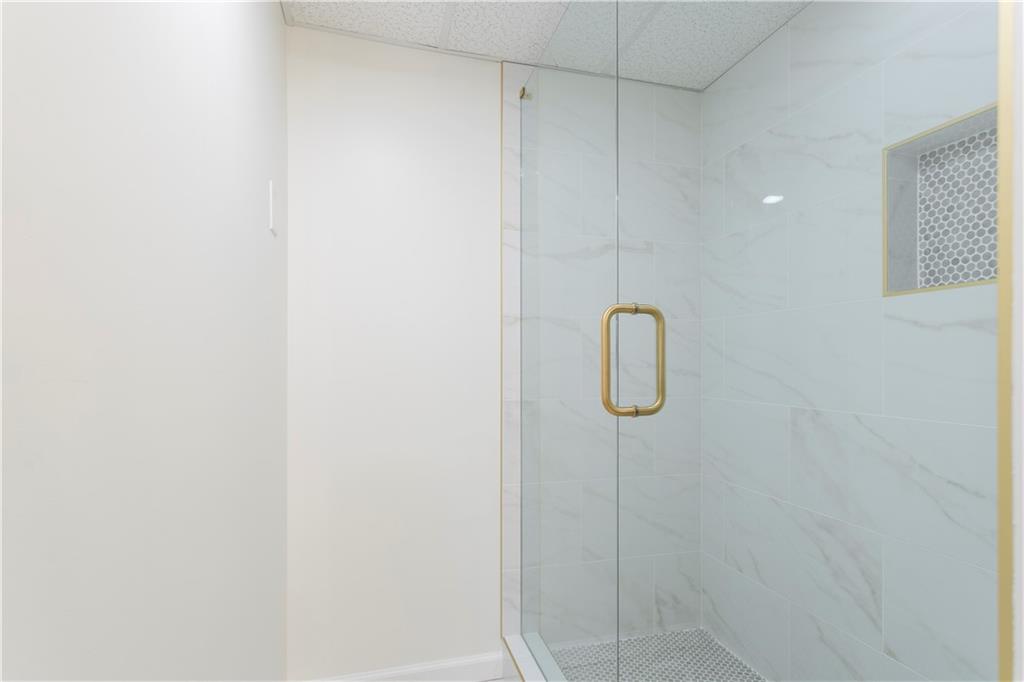 626 Reed Road Smyrna, GA 30082 - Photo 37 of 40 a bathroom with a shower