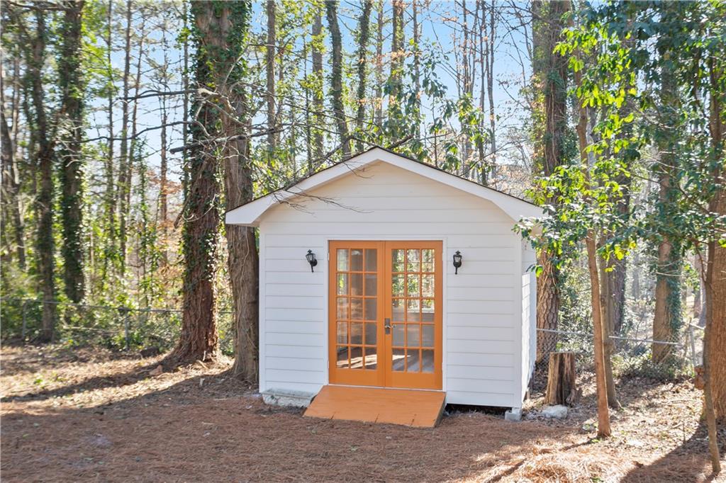 626 Reed Road Smyrna, GA 30082 - Photo 8 of 40 a front view of a house with a yard