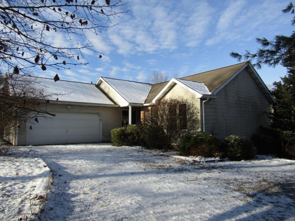 162 Heck Road Sarver, PA 16055 - Photo 1 of 27 a front view of a house with a yard