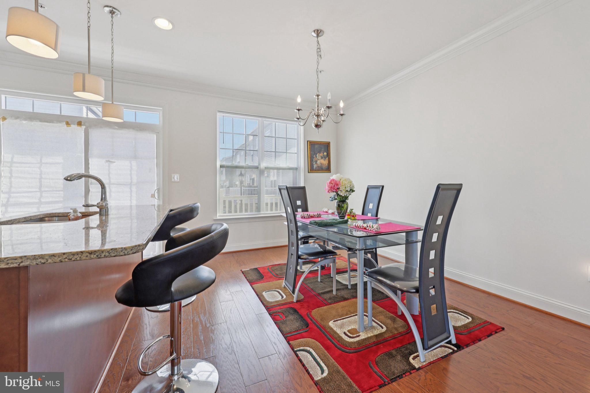 7206 Wood Meadow Way Lanham, MD 20706 - Photo 26 of 61 a work room with furniture and wooden floor