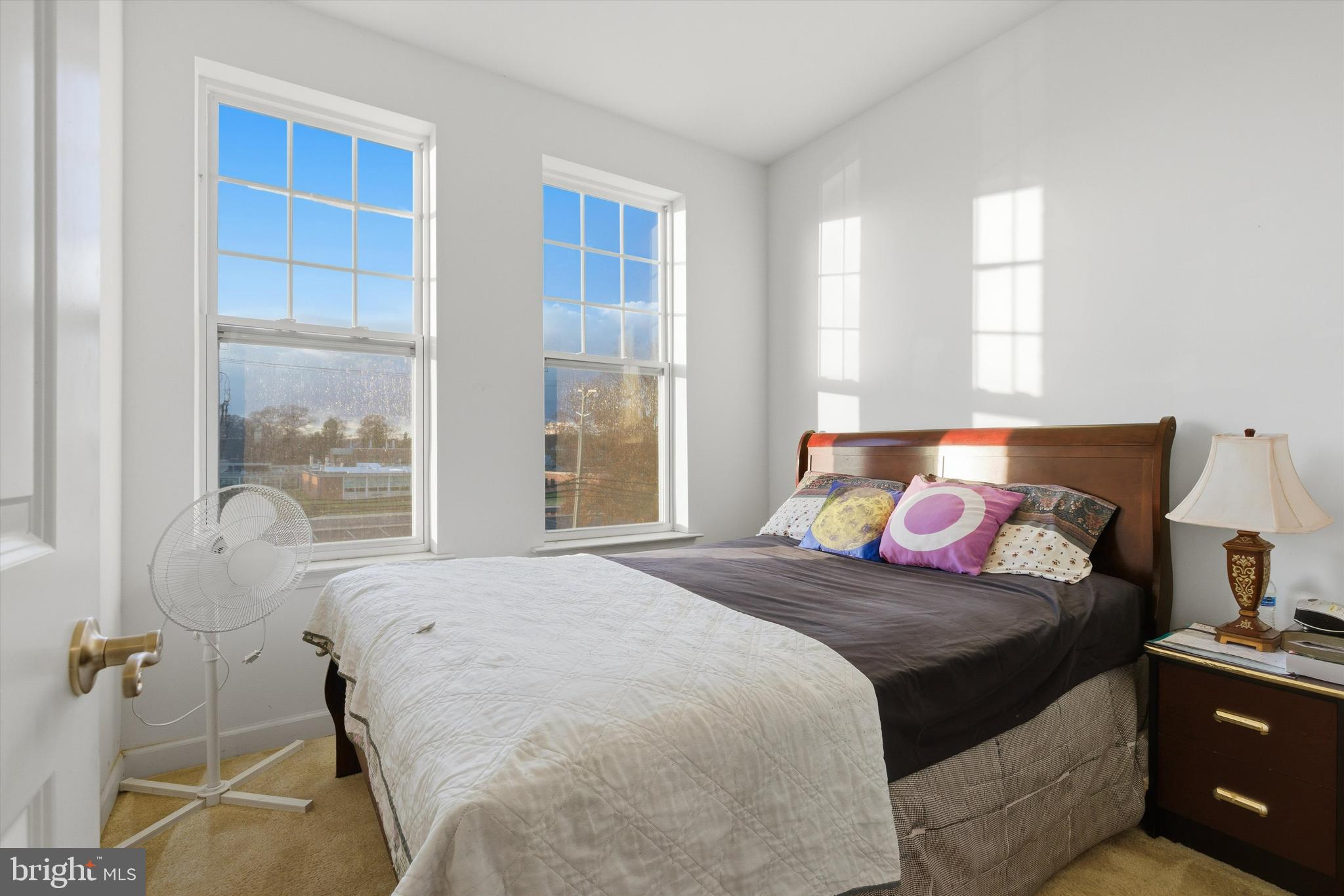 7206 Wood Meadow Way Lanham, MD 20706 - Photo 47 of 61 a bedroom with a bed and a window