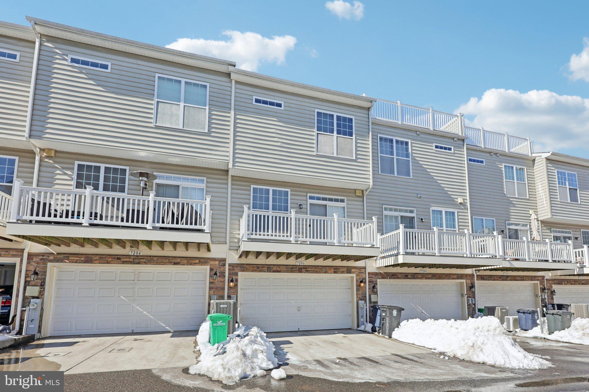 7206 Wood Meadow Way Lanham, MD 20706 - Photo 55 of 61 a view of a building with balcony