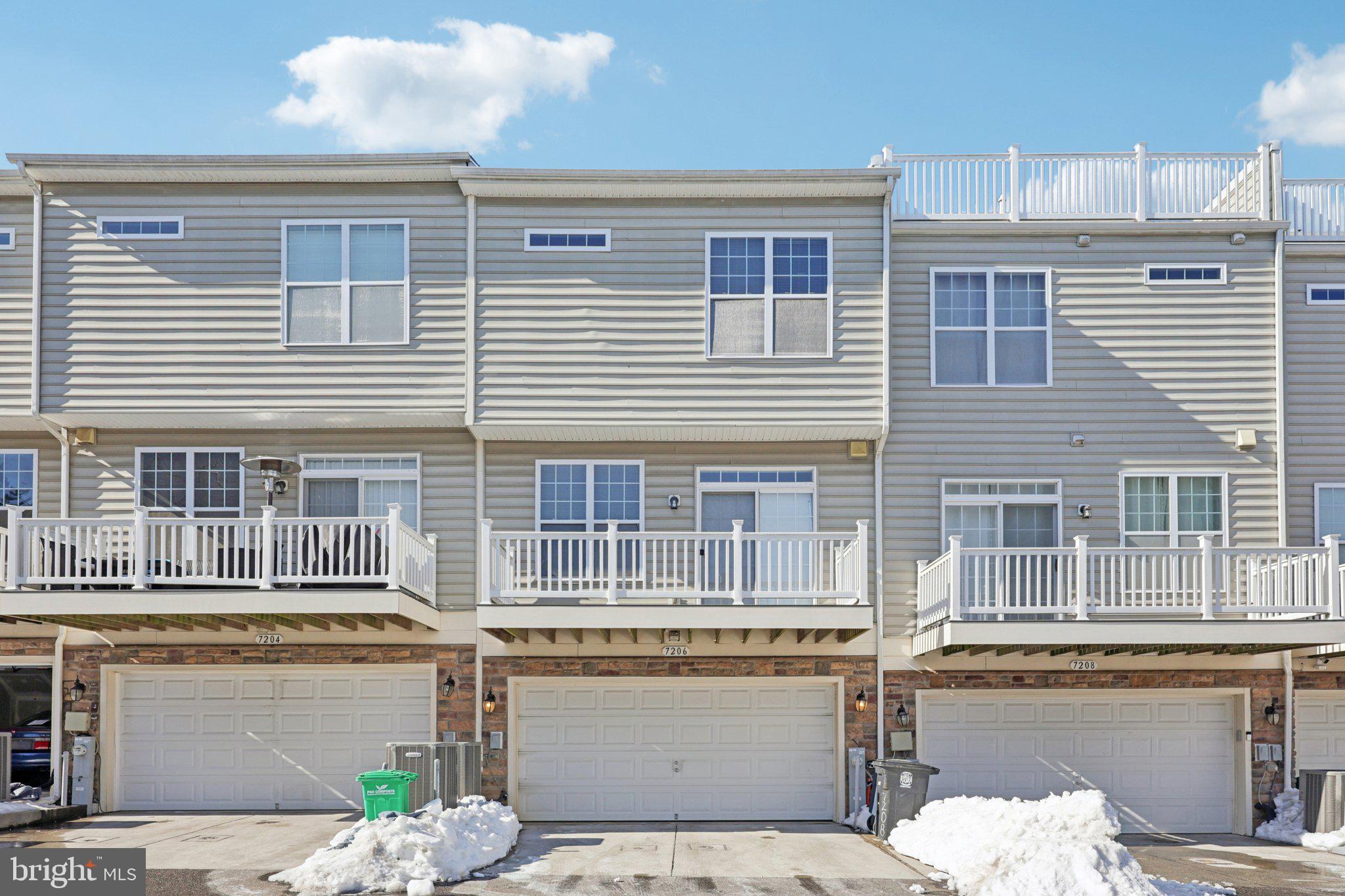 7206 Wood Meadow Way Lanham, MD 20706 - Photo 61 of 61 a front view of a house with a garage