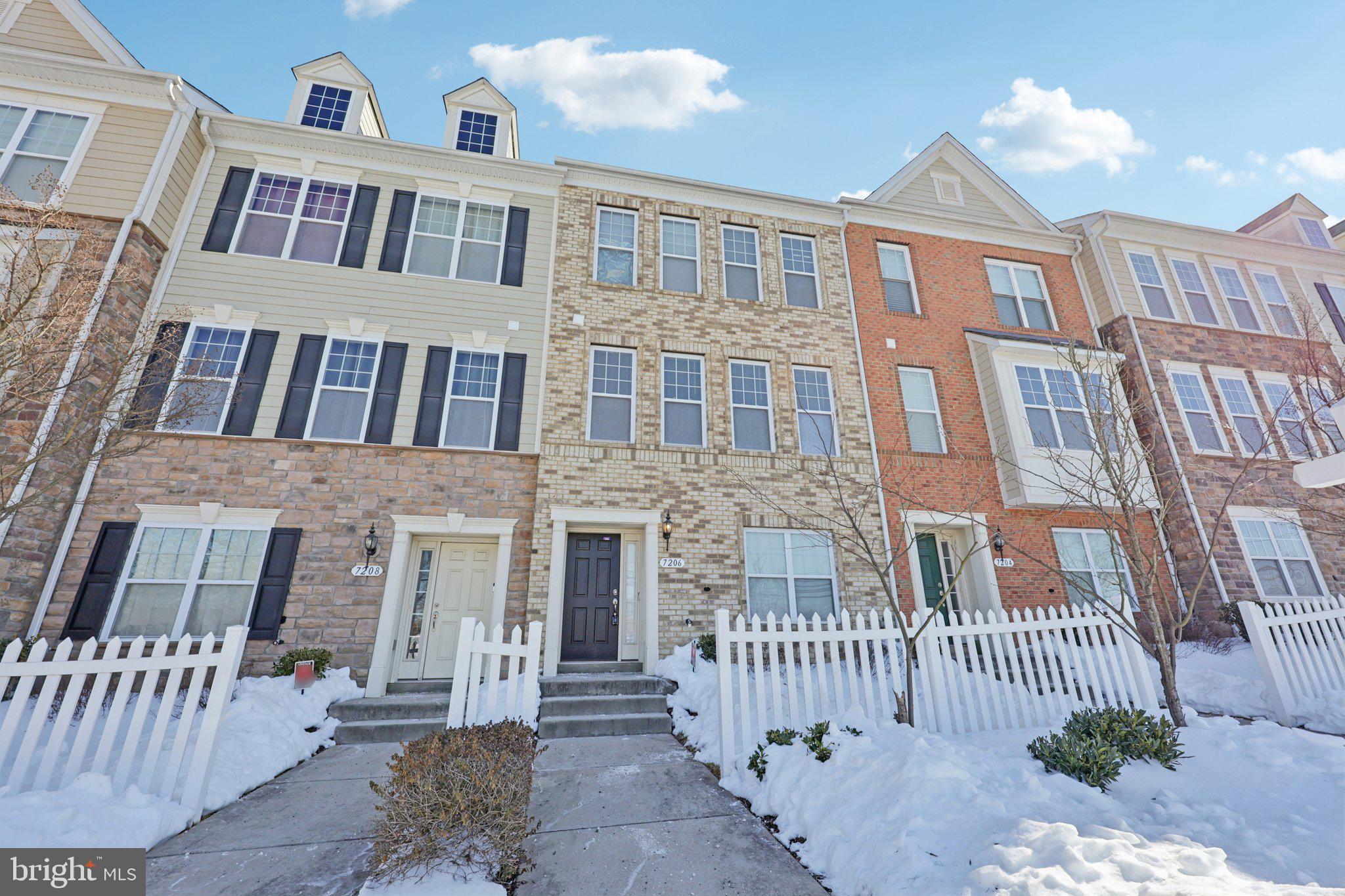 7206 Wood Meadow Way Lanham, MD 20706 - Photo 8 of 61 a front view of a brick building