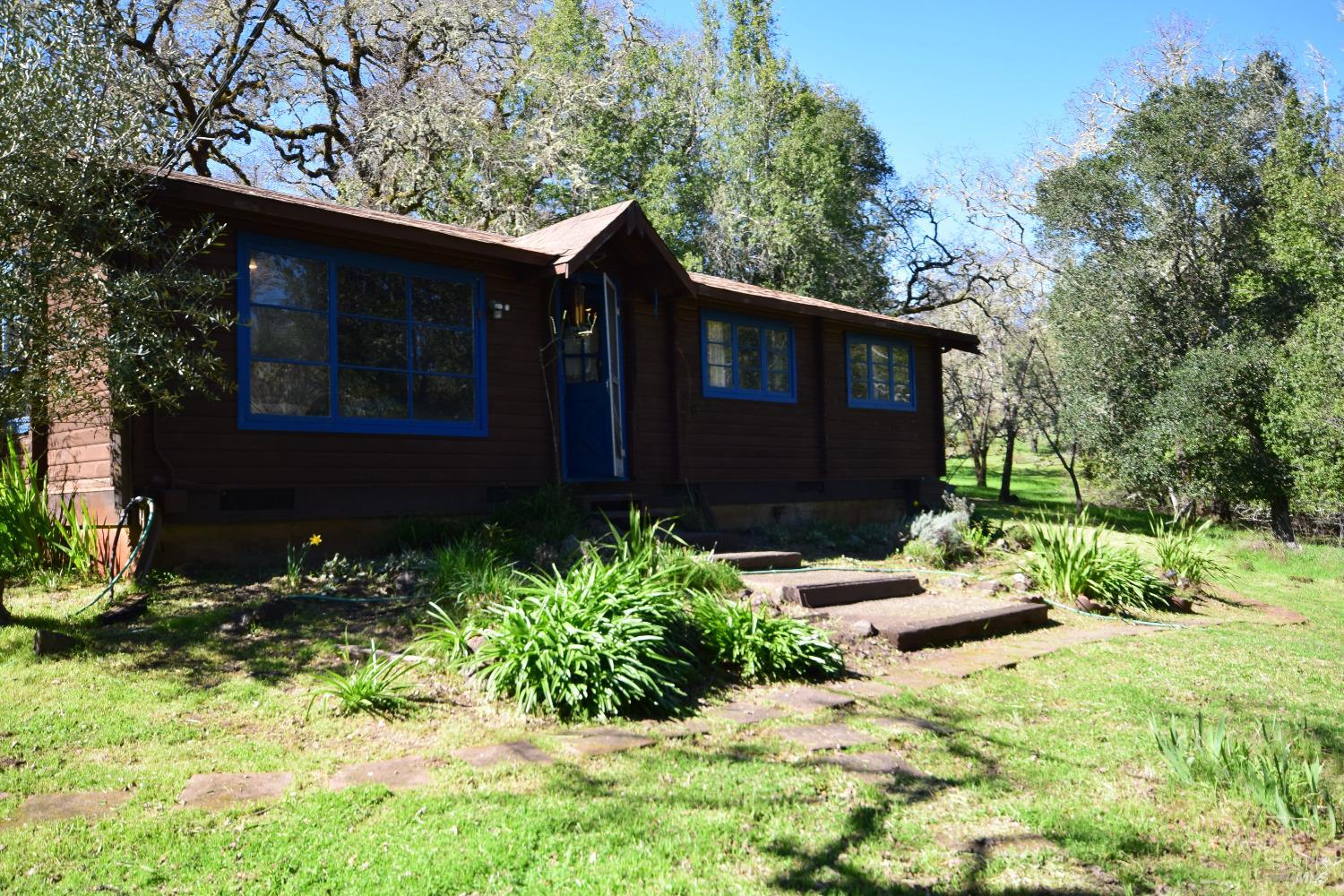 4042 Bones Road Sebastopol, CA 95472 - Photo 1 of 1 a backyard of a house with lots of green space