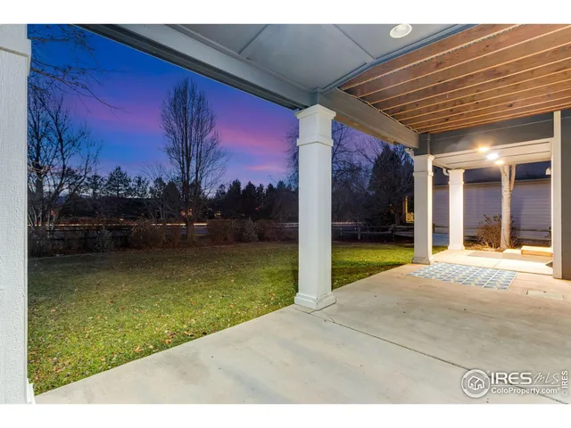 a view of swimming pool with a yard