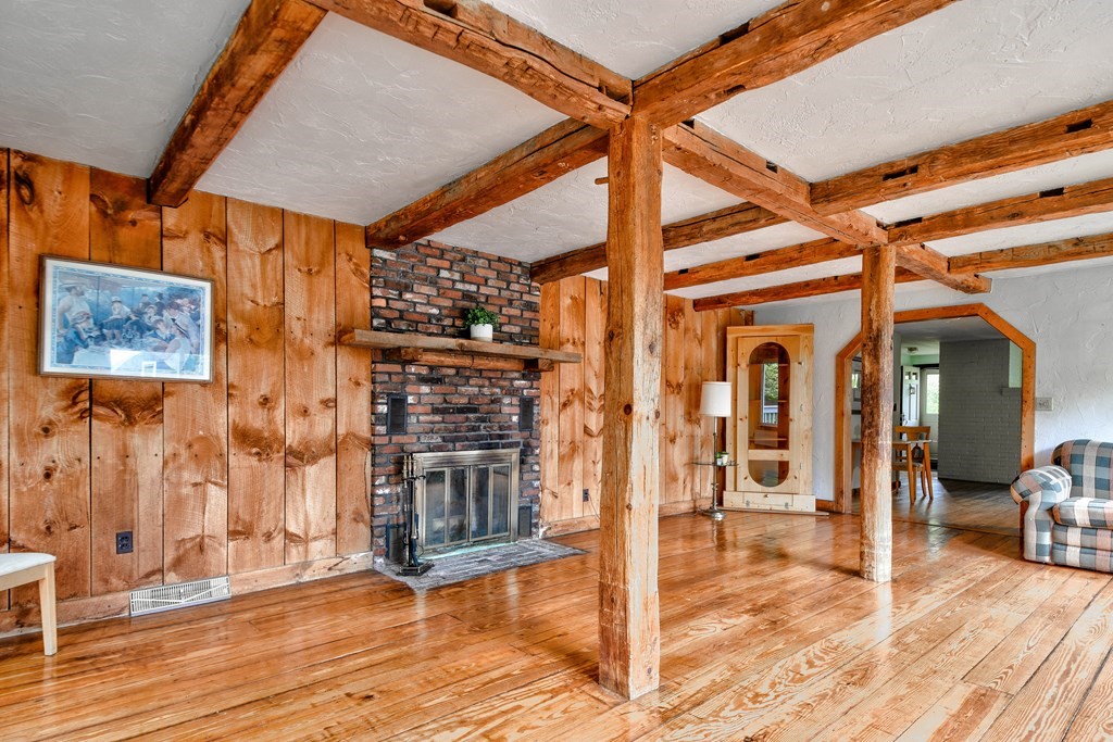 186 Edmands Road Framingham, MA 01701 - Photo 15 of 26 a view of a livingroom with wooden floor and an entrance