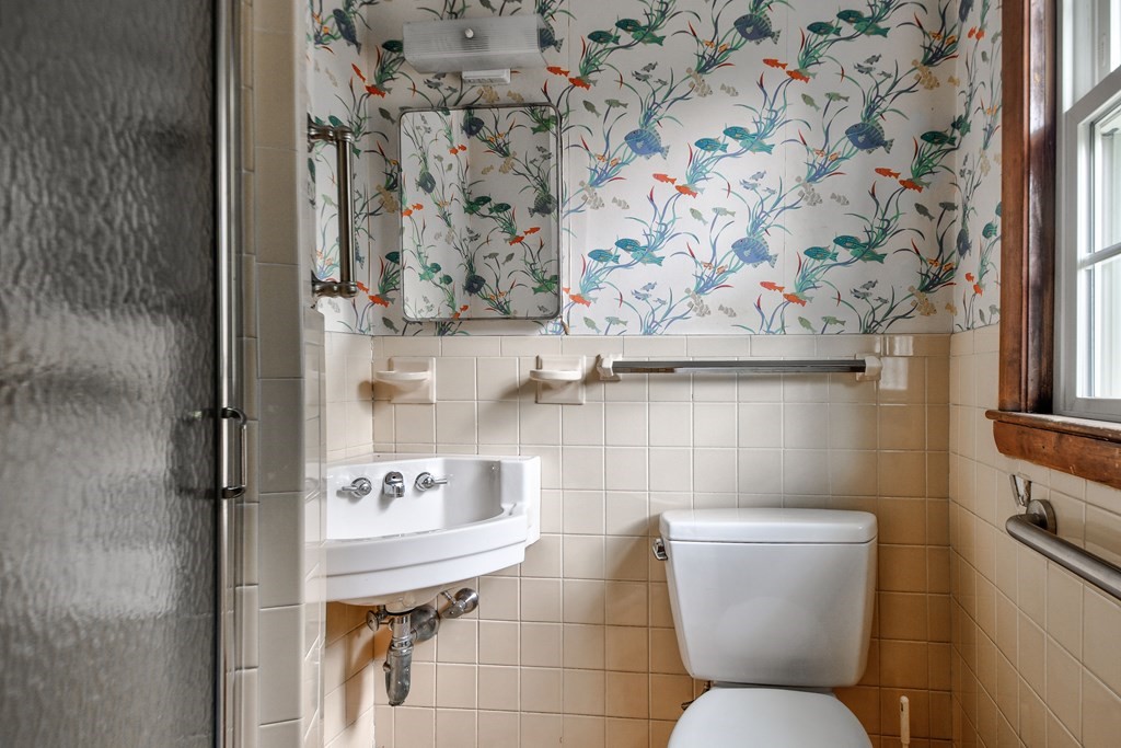 186 Edmands Road Framingham, MA 01701 - Photo 19 of 26 a bathroom with a toilet and a sink