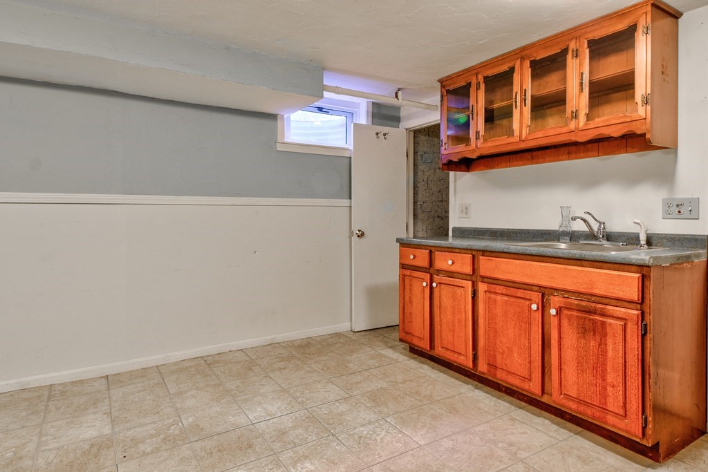 186 Edmands Road Framingham, MA 01701 - Photo 22 of 26 a kitchen with stainless steel appliances a refrigerator and cabinets