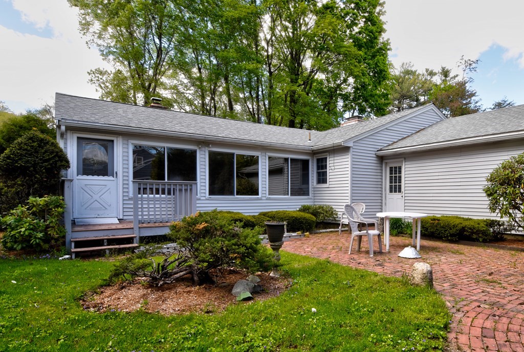 186 Edmands Road Framingham, MA 01701 - Photo 26 of 26 a backyard of a house with seating space