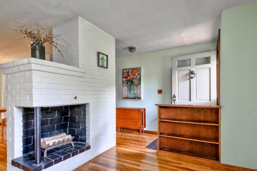186 Edmands Road Framingham, MA 01701 - Photo 4 of 26 a view of room with wooden floor and fan