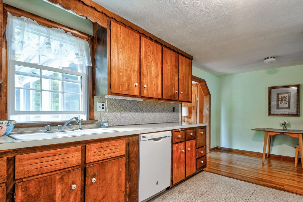 186 Edmands Road Framingham, MA 01701 - Photo 10 of 26 a kitchen with stainless steel appliances granite countertop sink stove and cabinets