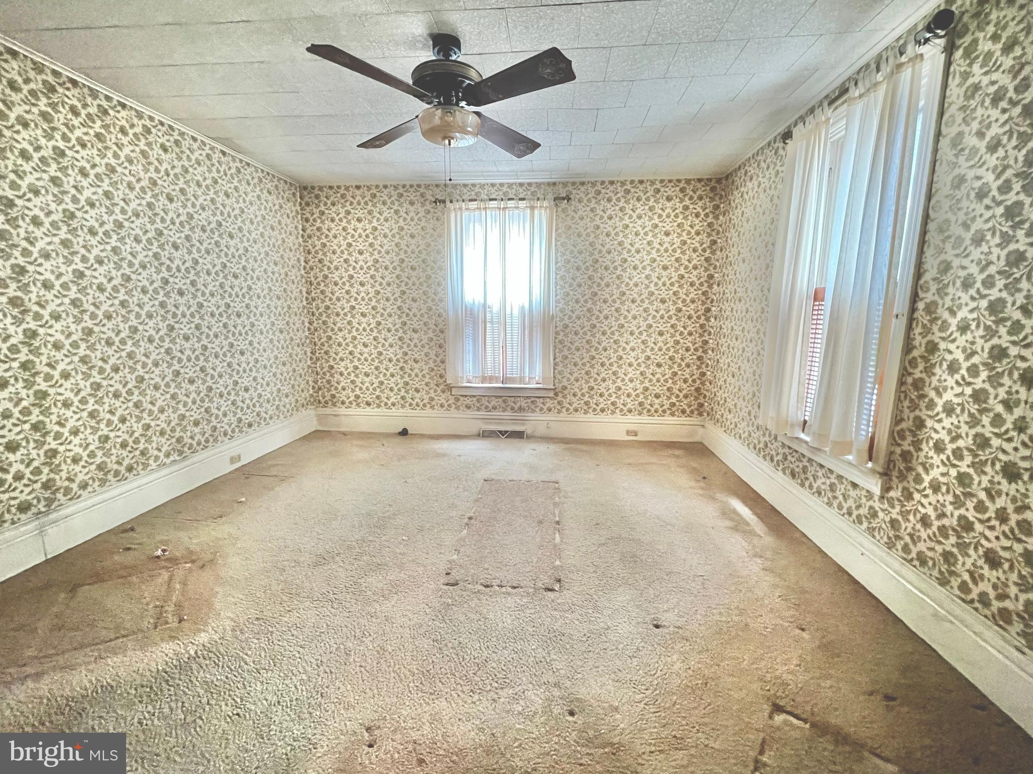 203 North Cedar Street Lititz, PA 17543 - Photo 7 of 34 an empty room with a empty space and windows