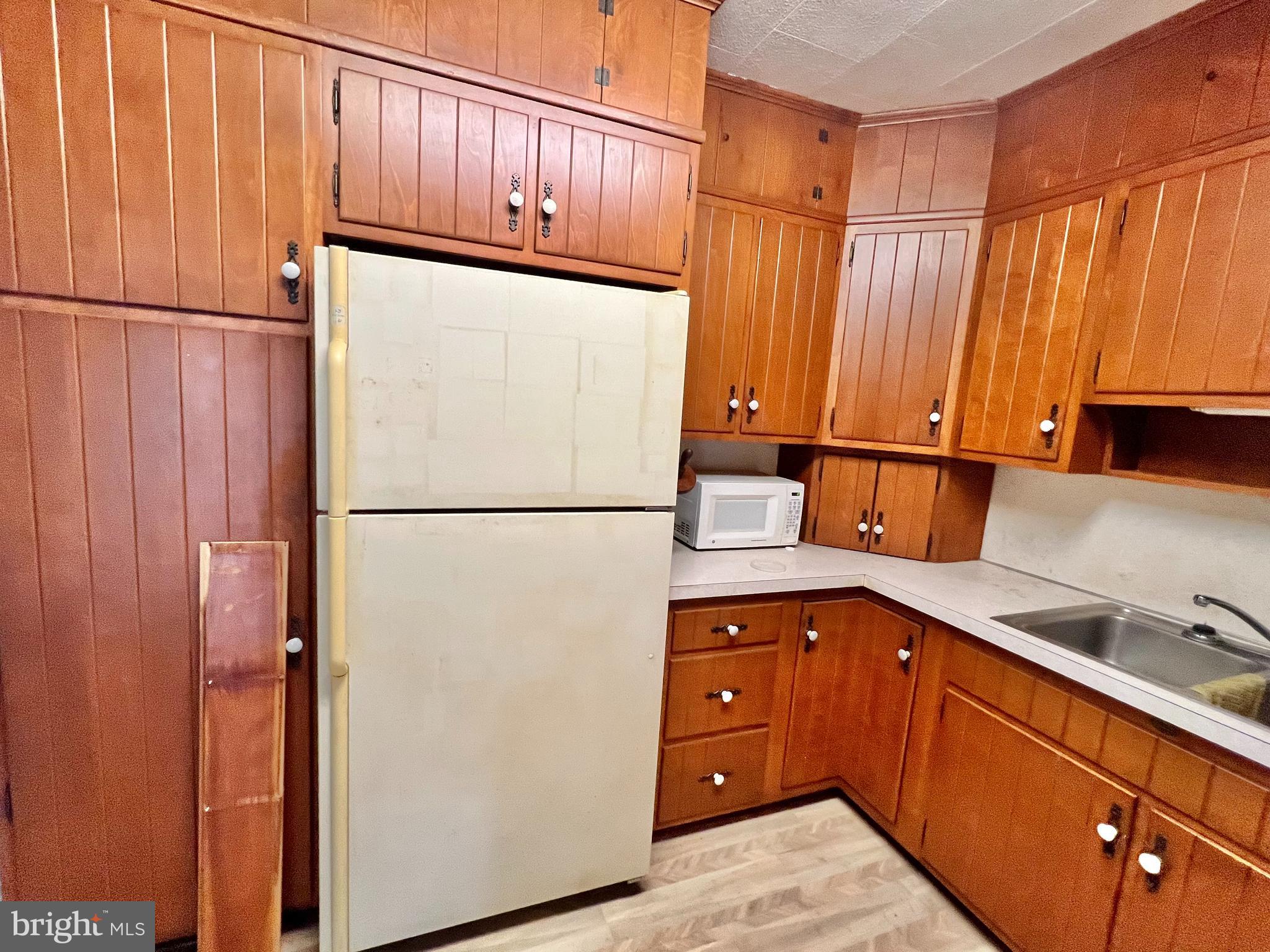 203 North Cedar Street Lititz, PA 17543 - Photo 10 of 34 a kitchen with stainless steel appliances a refrigerator and a sink