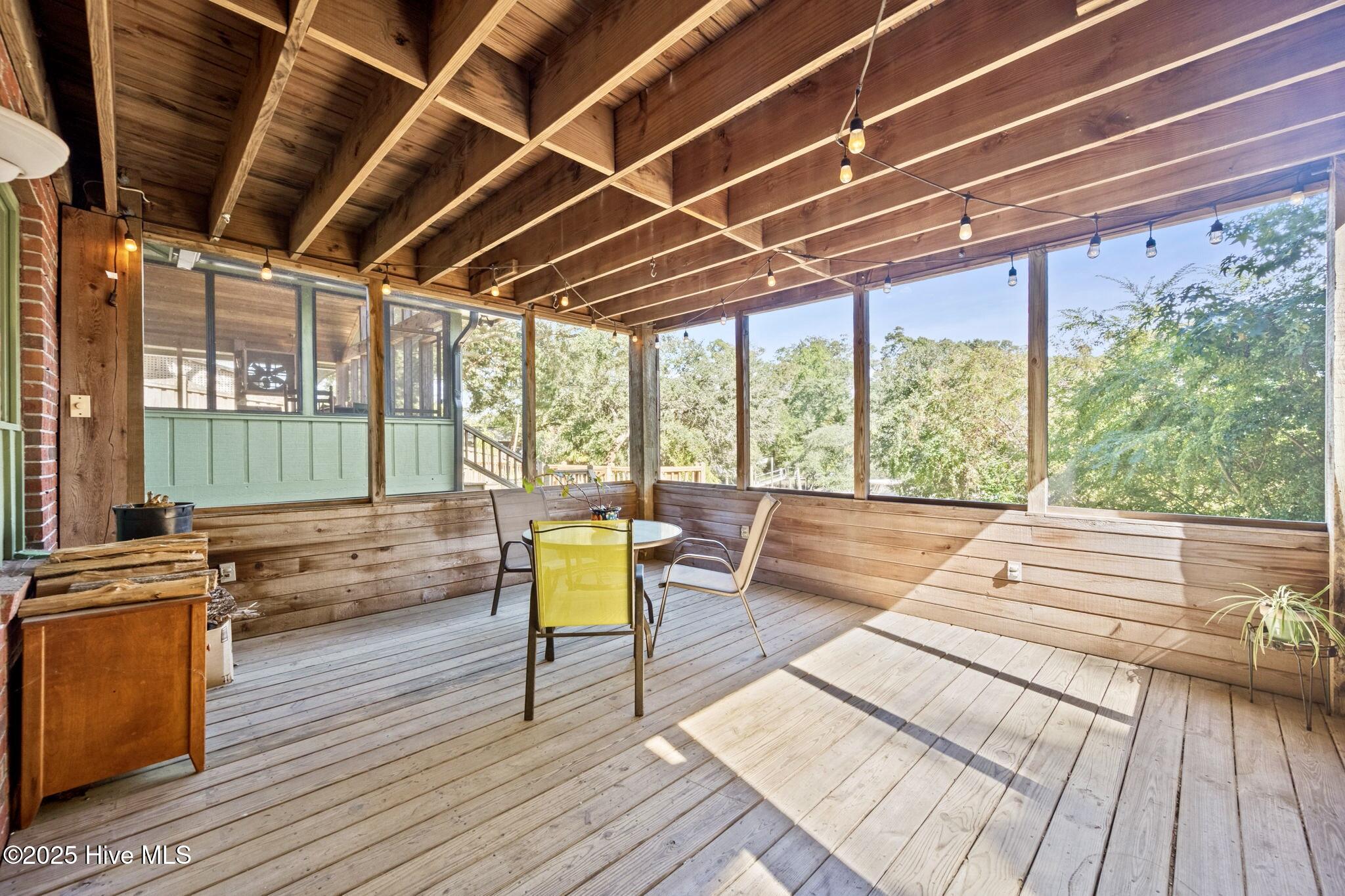 802 Sound View Drive Hampstead, NC 28443 - Photo 46 of 66 Screened porch off of kitchen (unit 2)