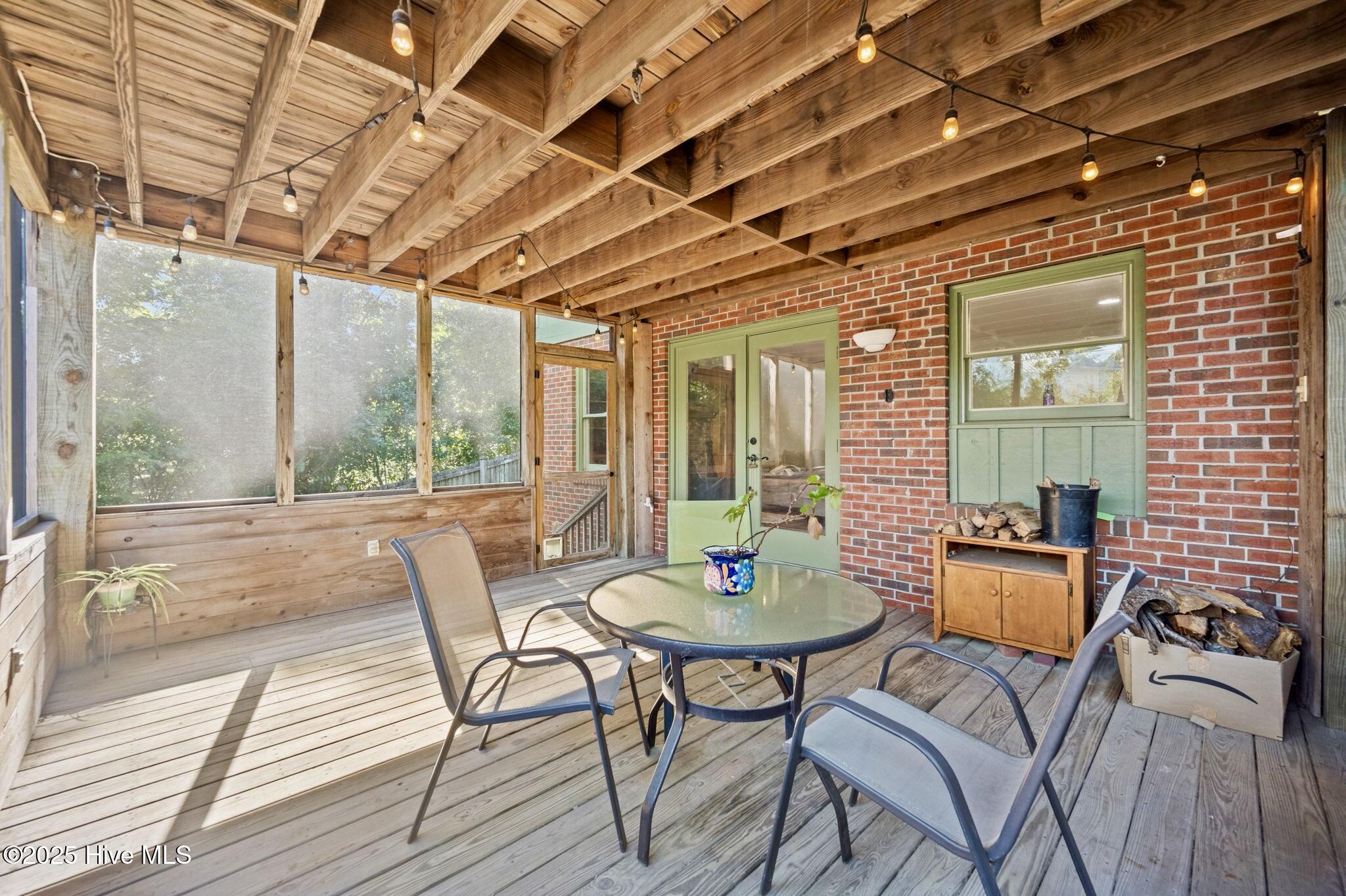 802 Sound View Drive Hampstead, NC 28443 - Photo 47 of 66 Screened porch off of kitchen (unit 2)