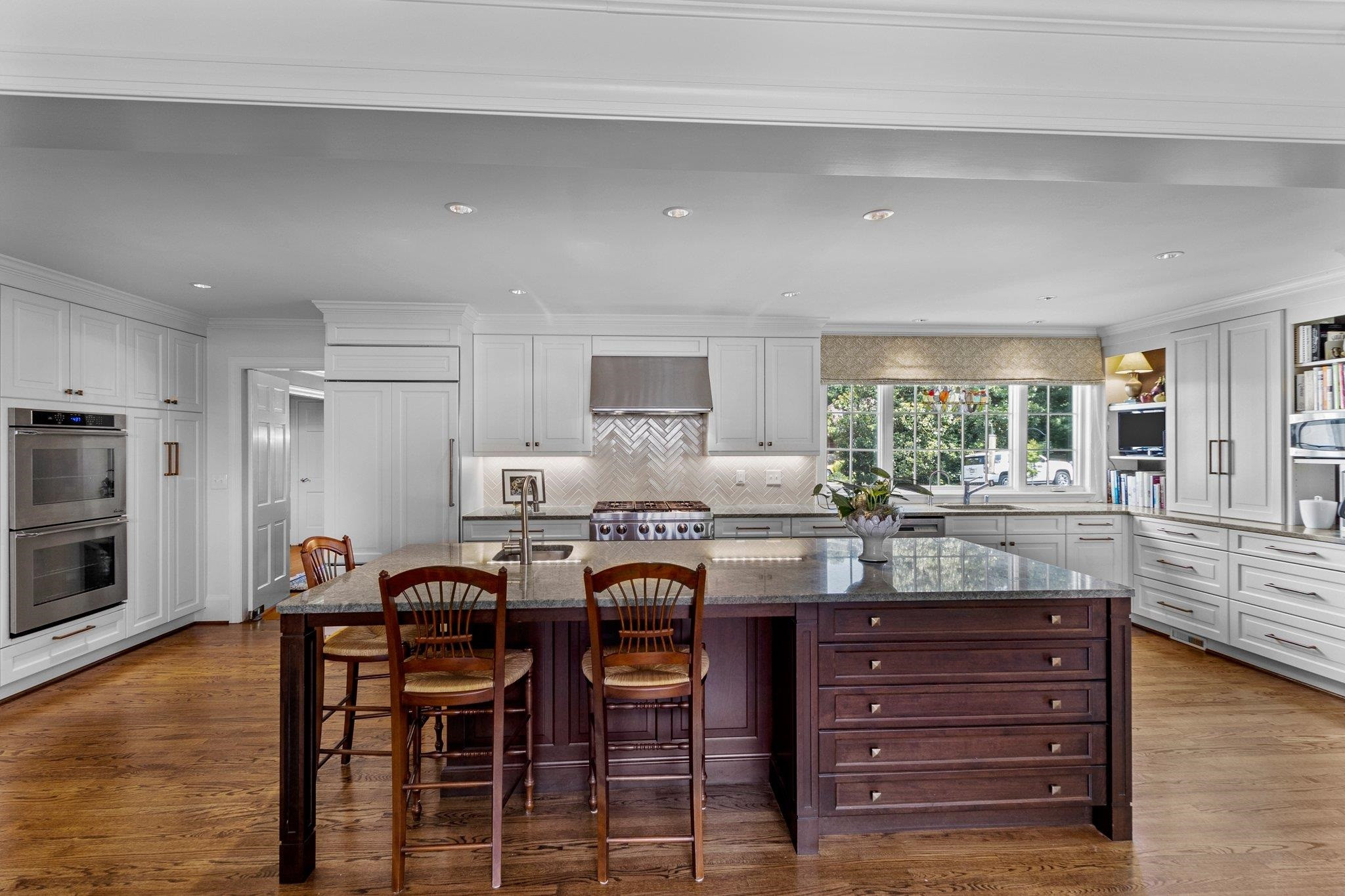 2217 St Marys Street Raleigh, NC 27608 - Photo 9 of 52 Impressive granite island countertop that is 9 ft 8 in X 4 ft 1 in. Enough room to hold many chairs with plenty of room for storage and prep work. Granite Countertop Island